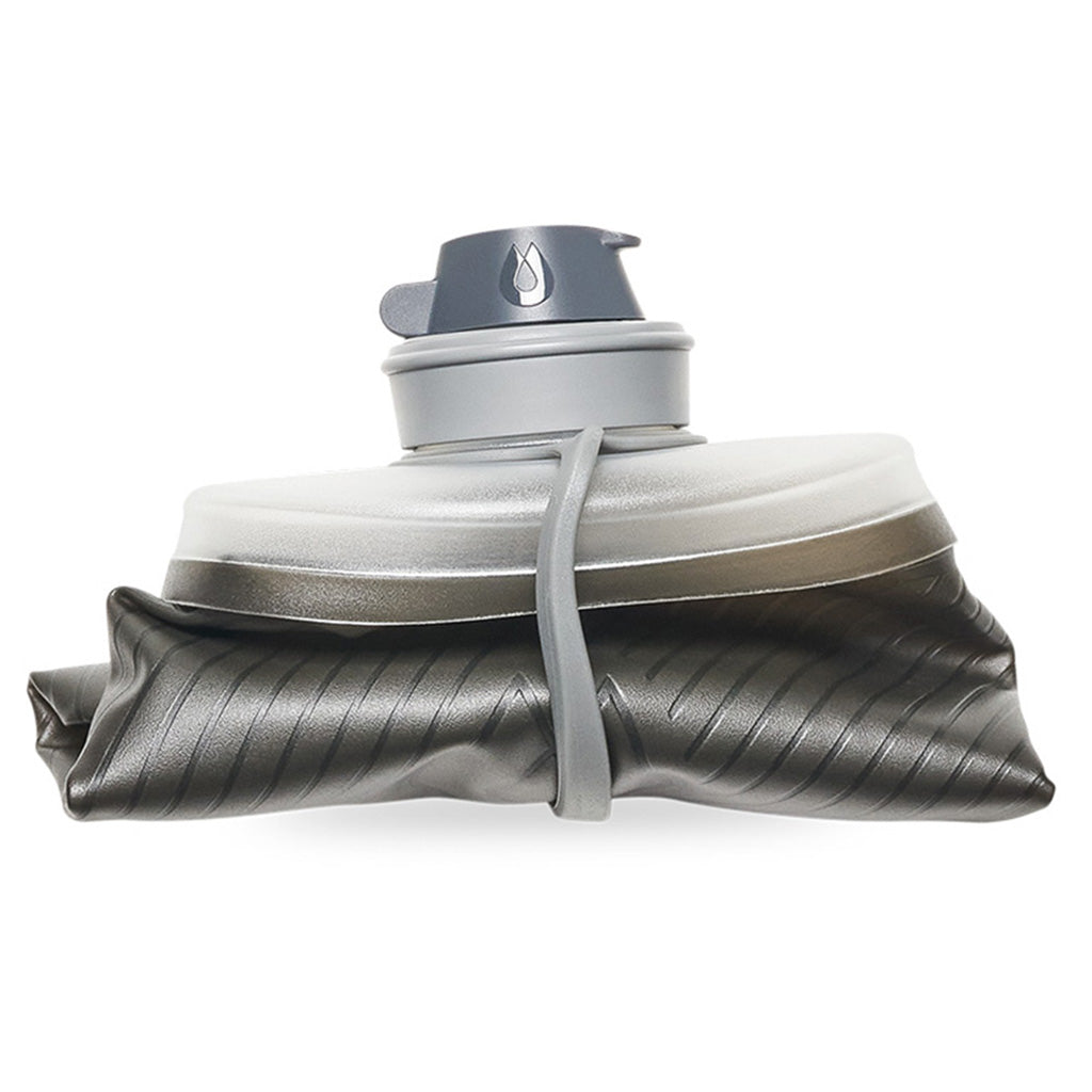 Hydrapak collapsible bottle shown folded  ultra-light for adventure travel.

