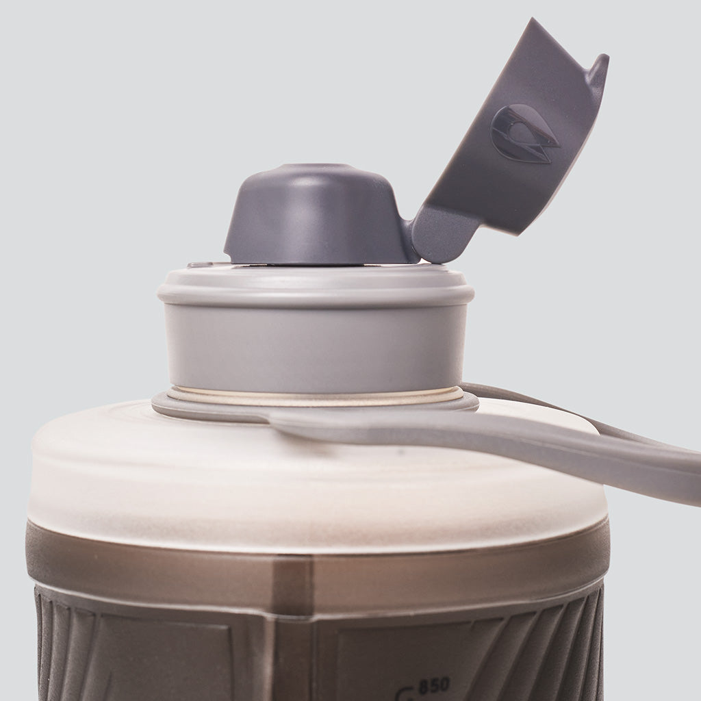 Hydrapak 1L bottle in side pocket of a hiking backpack – easy access hydration

