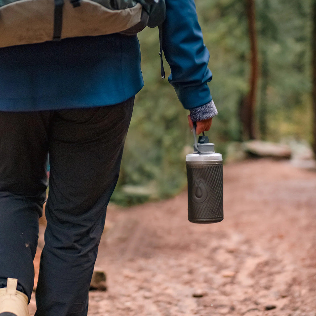 Hydrapak Flux in use outdoors – hydration for camping, hiking, and adventure sports

