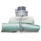 Demonstrating the pliability of the Sutro Green 1L Flux bottle
