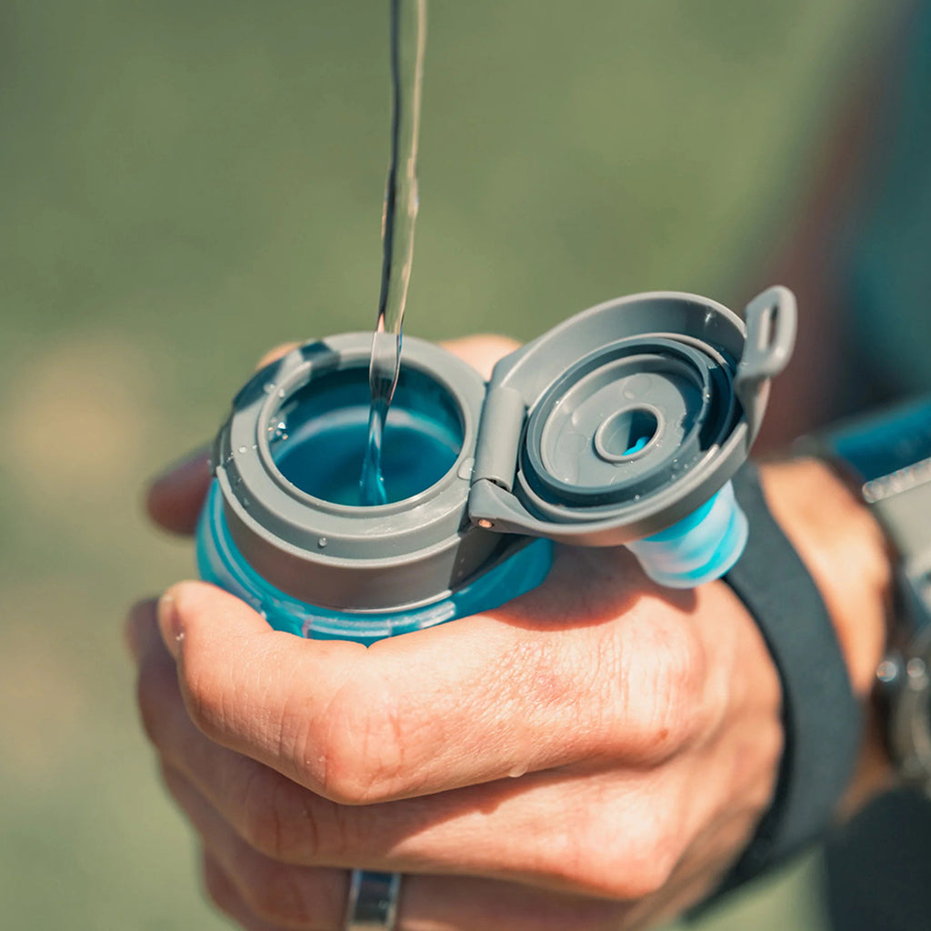 Malibu Blue 350ml Hydrapak Skyflask Speed: showcasing its handle, foldable design, and overall ease of carrying