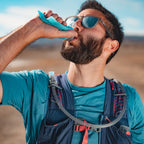 Flexible Malibu Blue Hydrapak Softflask (150ml), showcasing its pliable material and vibrant color.