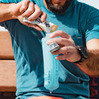 The attractive Malibu Blue Hydrapak Softflask (250ml) shown folded, making it ideal for easy packing on your travels.