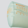 Foldable design of the Sutro Green Hydrapak Stow 1 Liter bottle, showcasing its compact size when empty from the back.