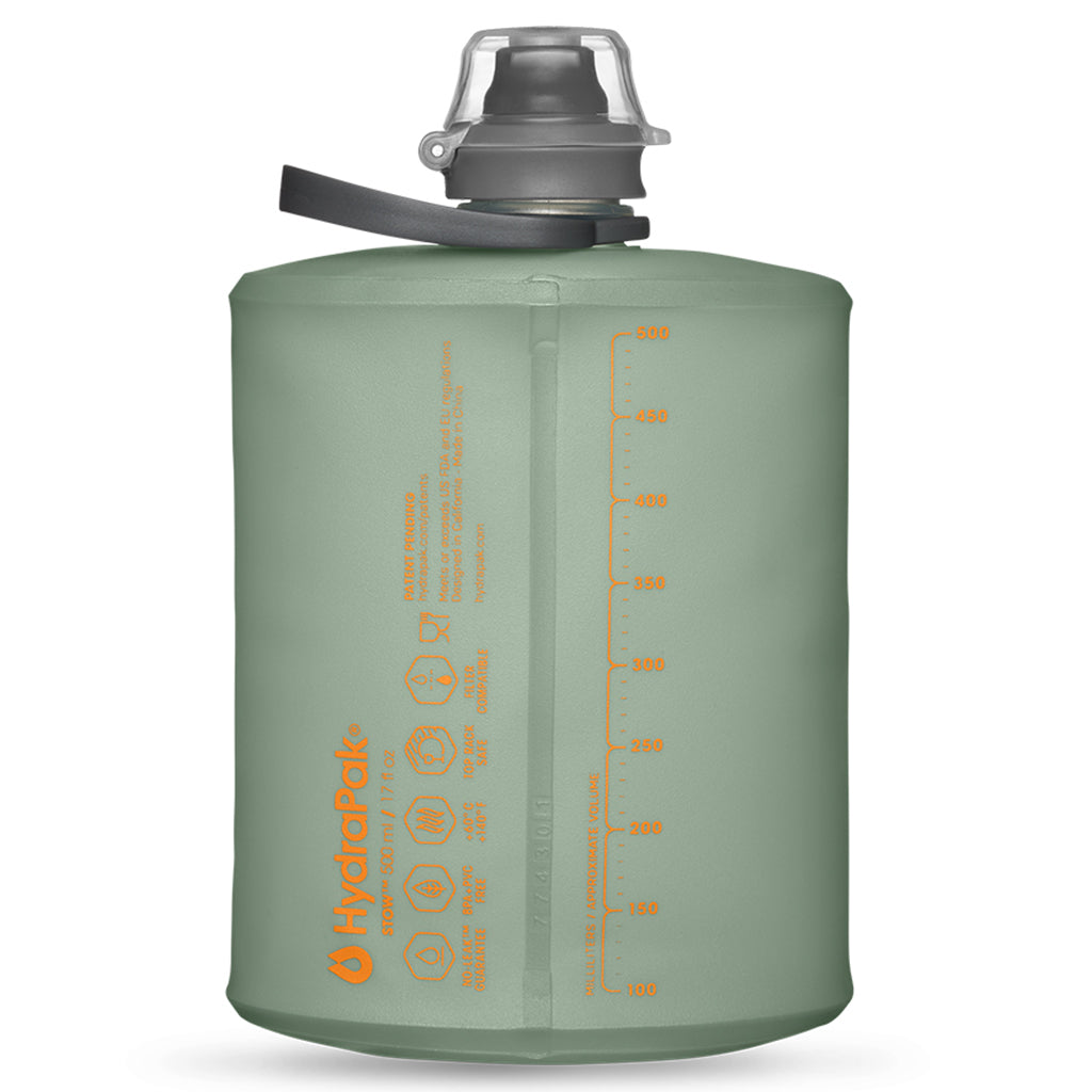 The compact form factor of the 500ml Sutro Green Hydrapak Stow bottle, emphasizing its space-saving measurements when empty or partially full.
