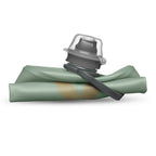 Foldable Sutro Green Hydrapak Stow 500ml, demonstrating its compact size when empty and rolled up.