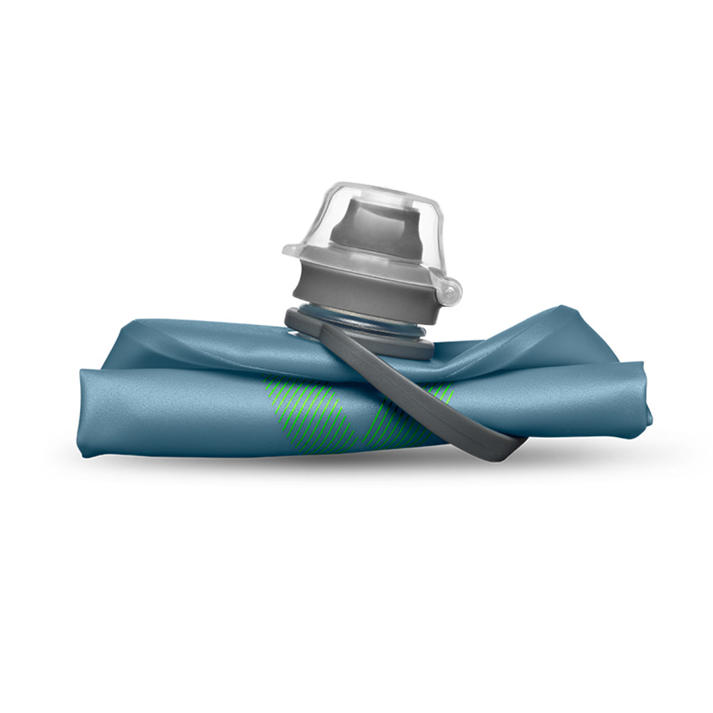 Demonstrating the packable nature of the Tahoe Blue Hydrapak Stow 500ml when folded.