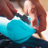 The Hydrapak Velocity 1.5L's universal hanger allows it to fit securely in a variety of hydration pack clips, hooks, and loops.