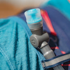 The Hydrapak Velocity 1.5L's convenient universal hanger in Malibu Blue, making it simple to load and unload the bladder from your pack for evening cleaning after your hike.