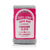 A folded yellow Juice Lubes Juice Rag microfiber finishing cloth with the brand logo clearly visible on a clean surface.

