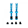 A pair of teal Juice Lubes tubeless valves (65mm) with their caps on, showcasing the vibrant color and sleek design against a clean background