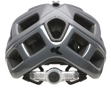 dark grey matte KED Crom helmet made of carbon fiber, showcasing a reflective logo, perfect for cycling safety and style