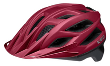 Red K2 helmet featuring a black vise, labeled as KED HELMET COMPANION in Merlot Grey Matt finish.
