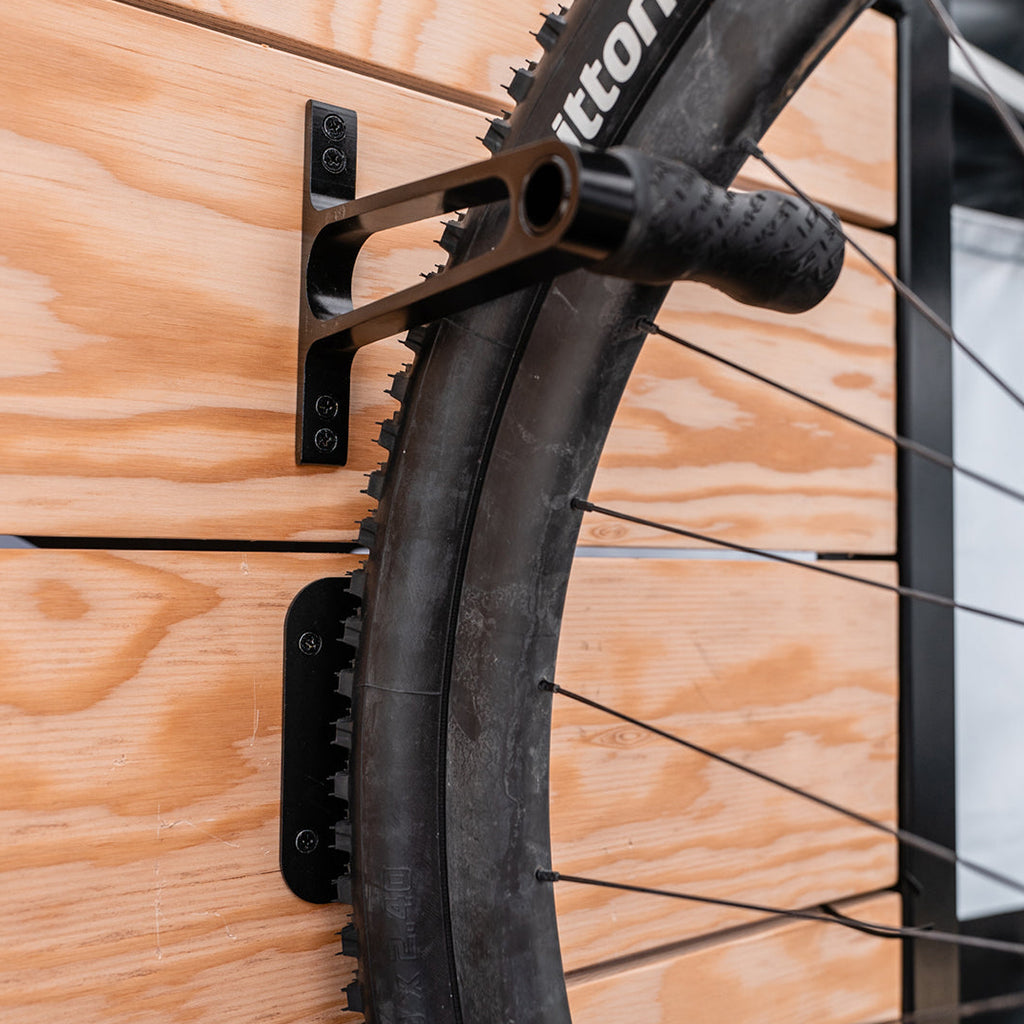 Lezyne CNC Alloy Wheel Hook installed on garage wall