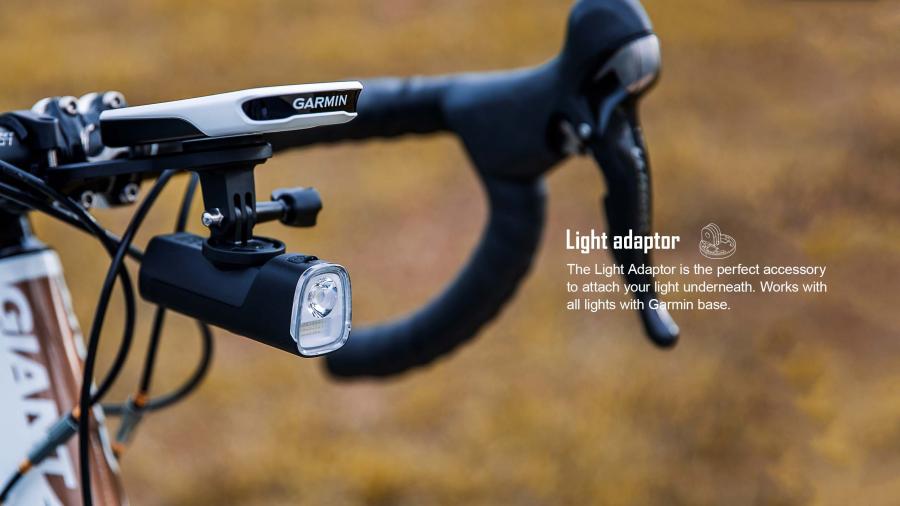 A close-up of the Magicshine Garmin To GoPro Adapter, showing its Garmin quarter-turn interface on one side.