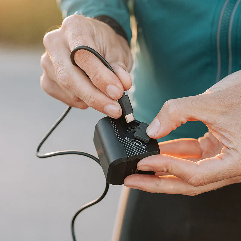 Close-up of MAGICSHINE FRONT LIGHT EVO 1100 with visible USB port