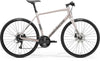 Side view of the Merida Speeder 100 III1, showcasing its powerful disc brakes and triple chainring drivetrain.