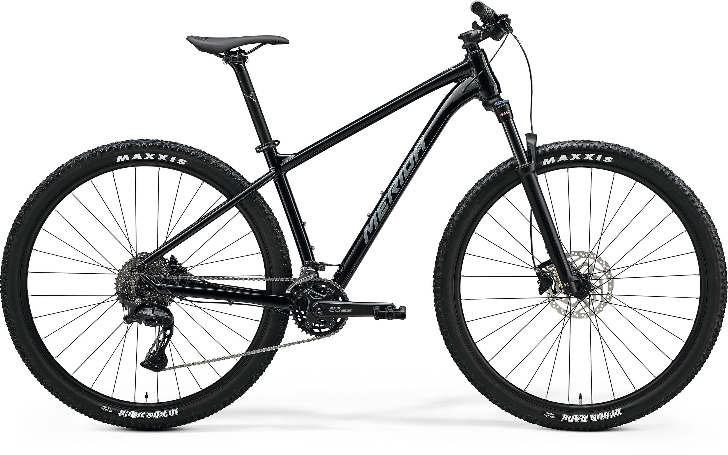 Side view of a black Merida BIG.NINE 300 hardtail mountain bike with front suspension, black frame, and Maxxis tires.

