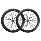 two black and gold bicycle wheels on a white surface, highlighting the Magene EXAR Ultra DB607 Carbon Wheelset design.