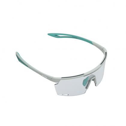 Close-up of Magicshine Rouler Night Vision cycling sunglasses in Green/Blue, showcasing the expansive PC lens for exceptional optical clarity and stylish green and blue aesthetics.