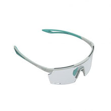 Close-up of Magicshine Rouler Night Vision cycling sunglasses in Green/Blue, showcasing the expansive PC lens for exceptional optical clarity and stylish green and blue aesthetics.