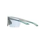 Magicshine Rouler Night Vision lens demonstrating enhanced contrast in low-light conditions, perfect for evening cycling, in a vibrant green/blue tint.