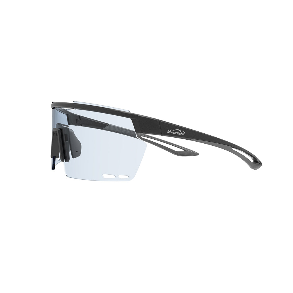 Close-up of Magicshine Rouler Night Vision cycling sunglasses in Black/Grey, showcasing the expansive PC lens for exceptional vision and stylish black and grey aesthetics.