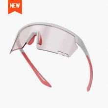 Close-up of Magicshine Rouler Night Vision cycling sunglasses in White/Pink, showcasing the expansive lens for exceptional optical precision and stylish white and pink aesthetics.