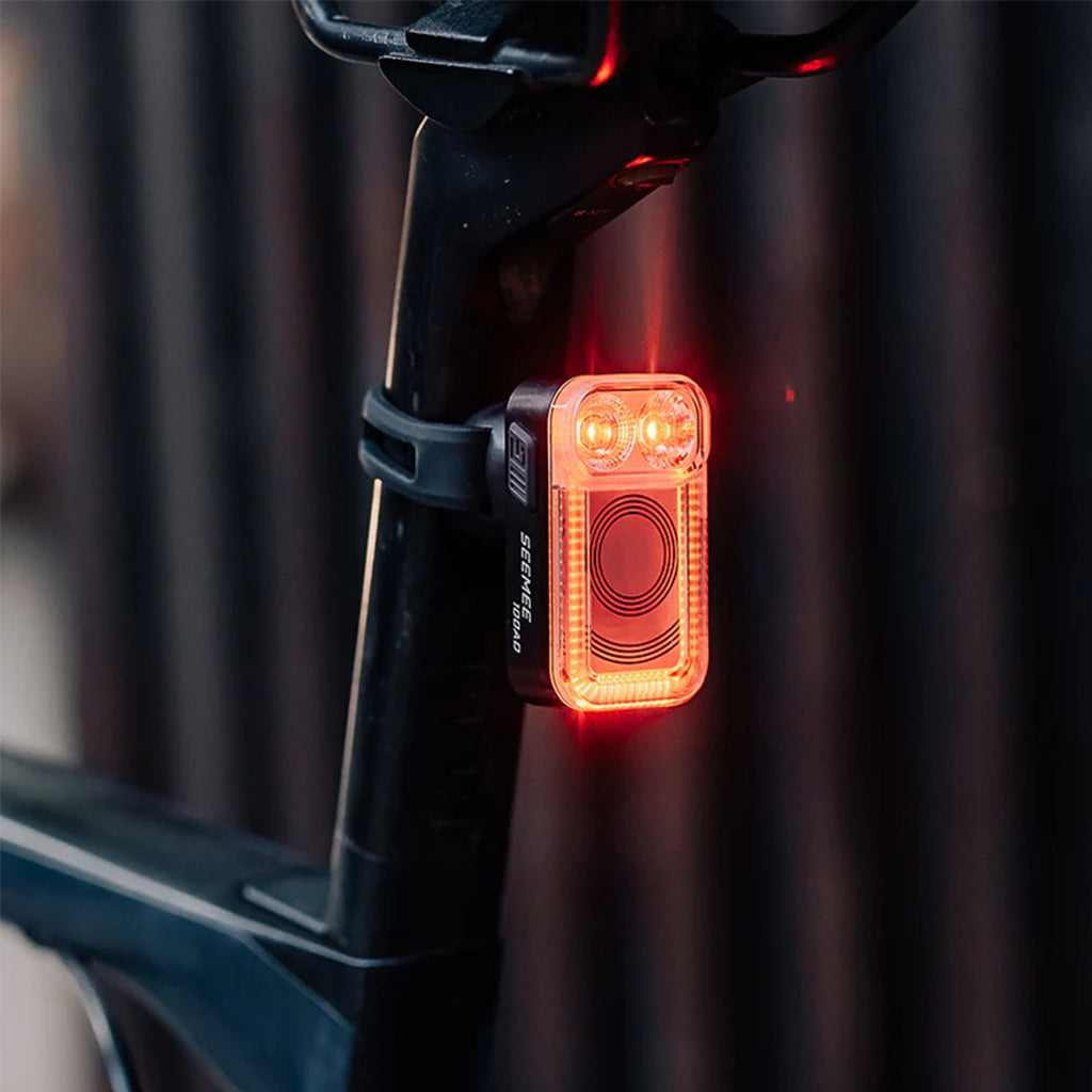 Image highlighting the high-intensity flashing alert from the Magicshine SEEMEE 100AD Radar Rear Light, designed to effectively lower chances of rear-end accidents.
