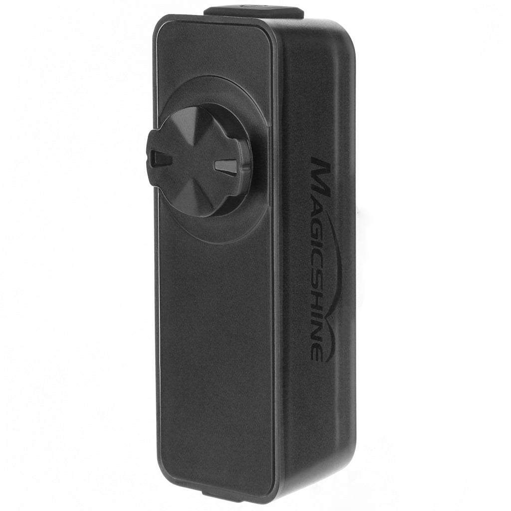 Close-up of the Magicshine SEEMEE 100 V2.0 cycling tail light, emphasizing the transparent optical filters for wide 260-degree beam spread.