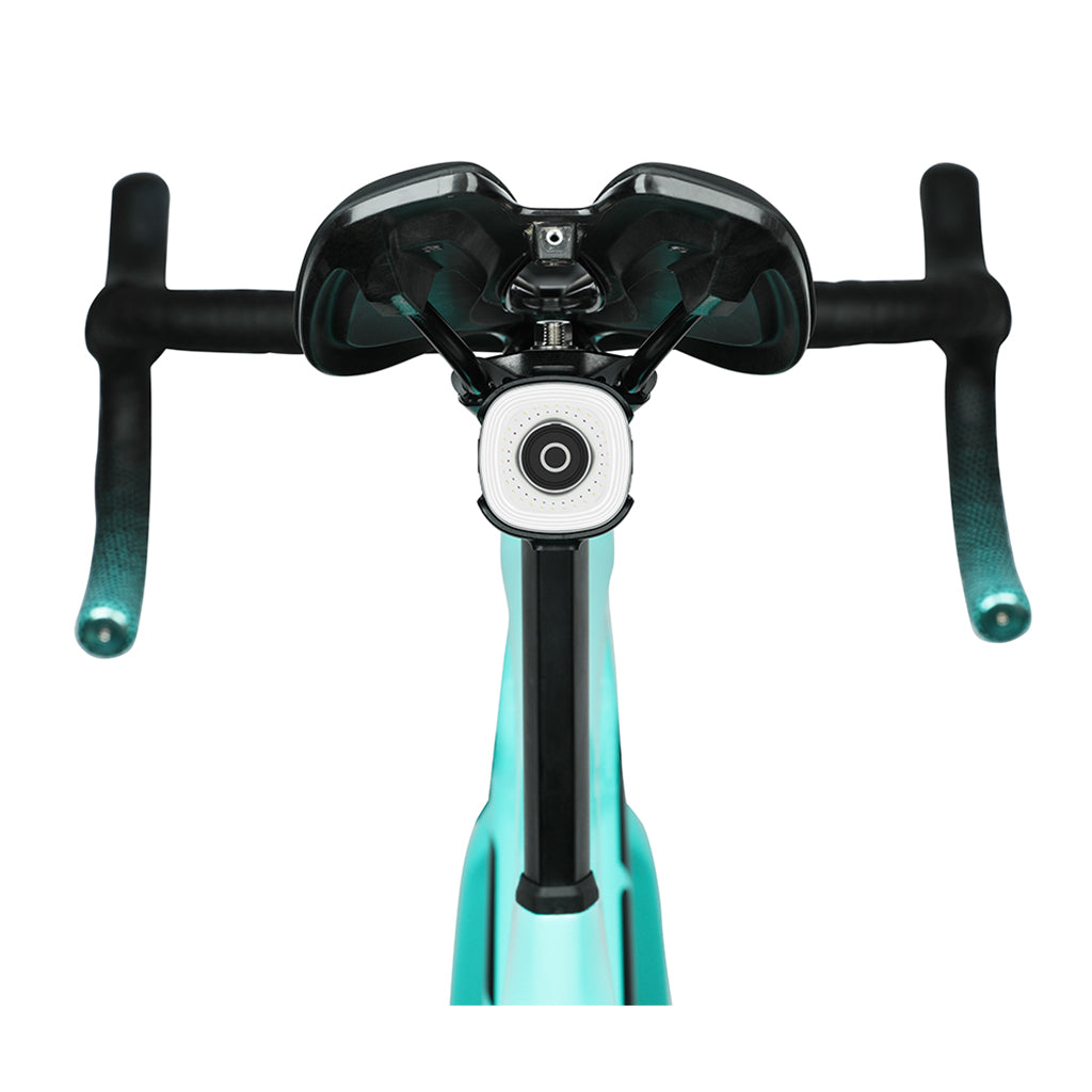 Rear view of SEEMEE 50 MAG light showing smart magnetic mount and dual-color safety lighting.

