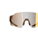The Magicshine Windbreaker Photochromic Sunglasses in a coffee brown color, highlighting their frameless construction and wraparound lens