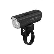 Magicshine ALLTY 600V2.0 bike light with a clear lens, mounted on a handlebar strap, shown at an angle on a white background.
