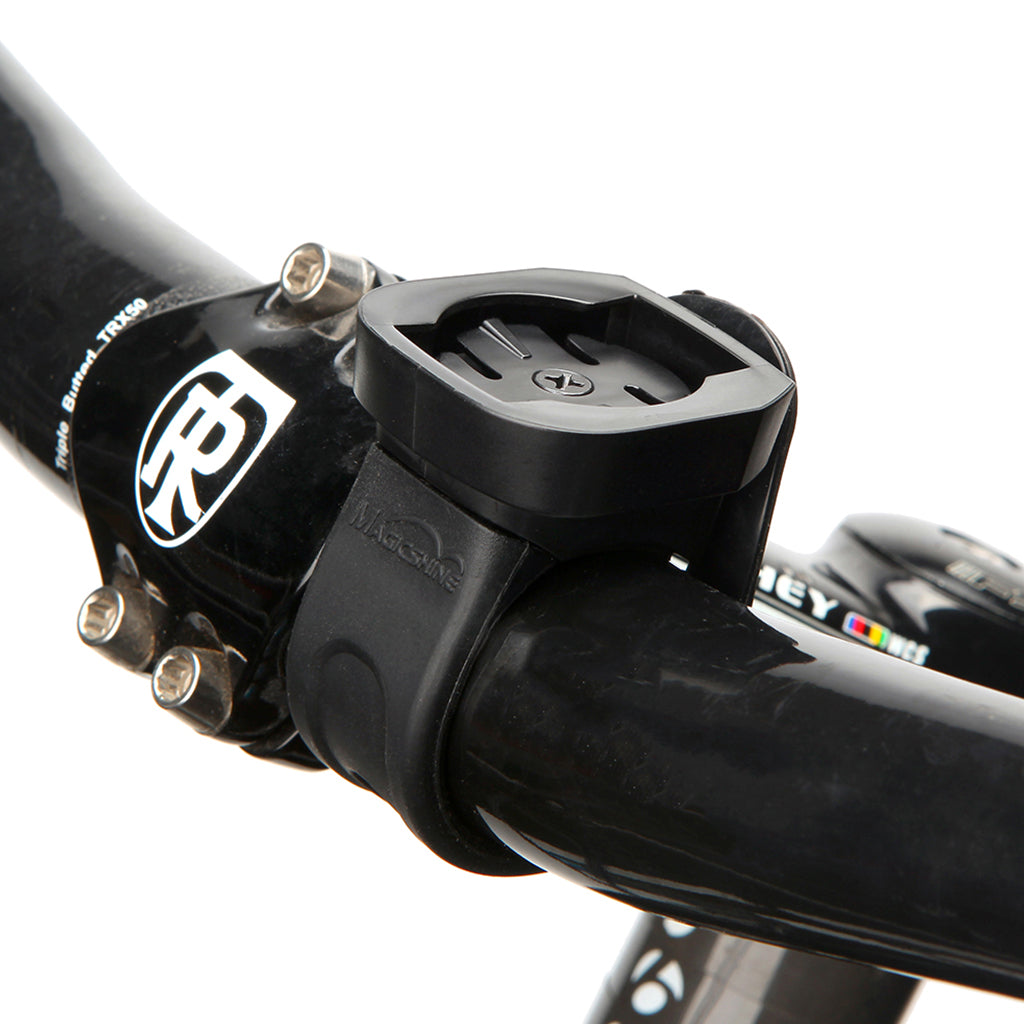 Magicshine ALLTY bike light securely mounted on handlebar with adjustable mount.