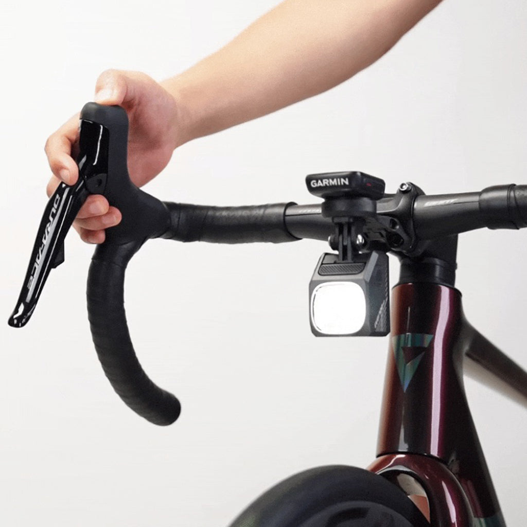 The Magicshine EVO 1700SD light is shown from a side angle