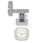 Front view of a white Magicshine EVO 1700 bike light attached to a gray GoPro-style handlebar mount.