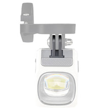 Front view of a white Magicshine EVO 1700 bike light attached to a gray GoPro-style handlebar mount.