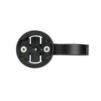 The Magicshine Garmin Aluminium Handlebar Mount is attached to a bicycle handlebar, providing a secure base for accessories.