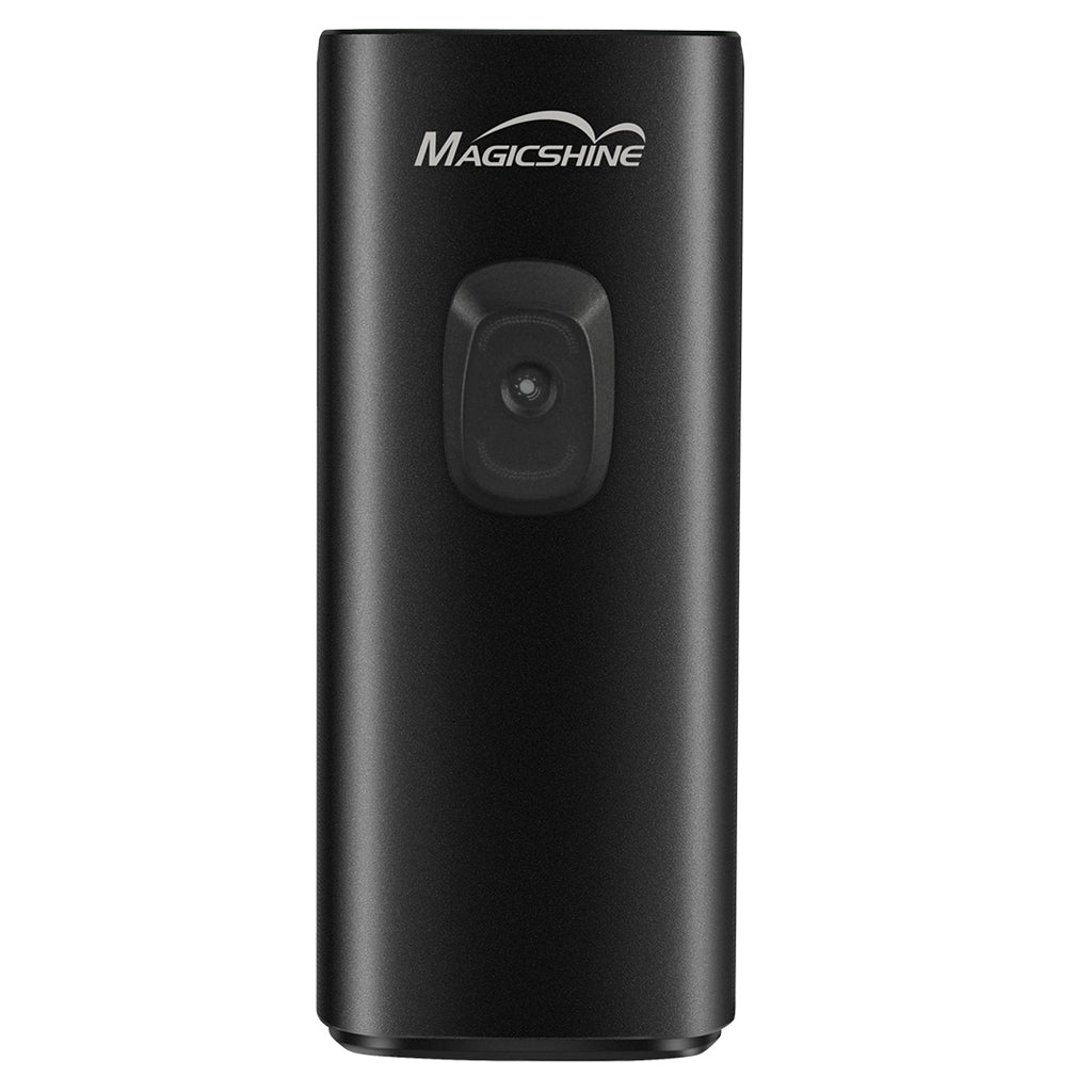 Close-up of Magicshine Ray 1600B light with illuminated power button.

