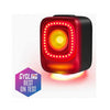 Close-up of the Magicshine SEEMEE 200 V3.0 Smart Rear Light, glowing bright red with a central yellow light, showcasing its powerful illumination and sleek cube design.