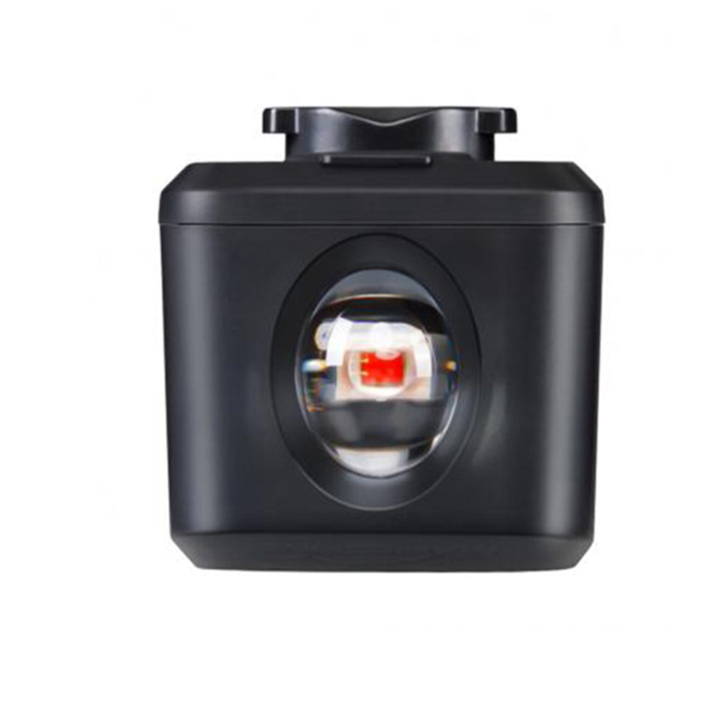 Top-down view of the Magicshine SEEMEE 200 V3.0 smart rear bike light, showcasing its power button and mounting mechanism on a white background, emphasizing its simple operation and cube design.