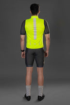 Man wearing Neon colored Gilet Sleeveless Cycling Jacket - back view