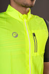 Man wearing Neon colored Gilet Sleeveless Cycling Jacket showcasing front pocket