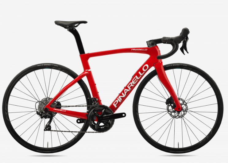 Pinarello racing bike with aerodynamic frame and precision disc brakes.