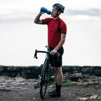 Ergonomic forest green Polar Breakaway Wave Bottle (710ml) with an easy-grip design, providing quick, spill-free hydration on rides."
