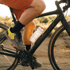 Polar Breakaway Wave cycling bottle (710ml) in forest green, featuring a high-flow Surge valve for effortless hydration during intense rides.