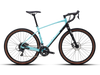 Light blue and black Polygon Bend R2 gravel bike with drop handlebars and brown-sidewall WTB Venture tires.