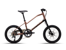 A bronze-colored Polygon Zeta 2 mini velo bike with black accents and small wheels.
