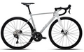 A clean, side-on shot of a white Polygon Strattos S5 Disc road bike, highlighting its aerodynamic frame and components.