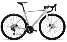 A clean, side-on shot of a white Polygon Strattos S5 Disc road bike, highlighting its aerodynamic frame and components.